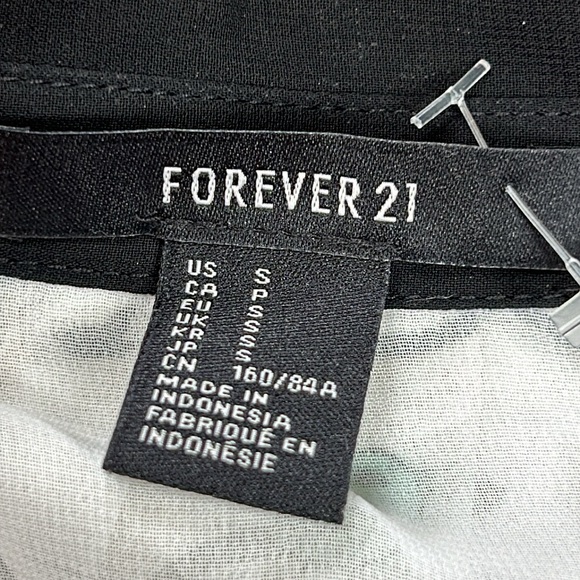 Forever 21 sleeveless dress. Cute bird print. Size Small. Pleated skirt. - Picture 2 of 14